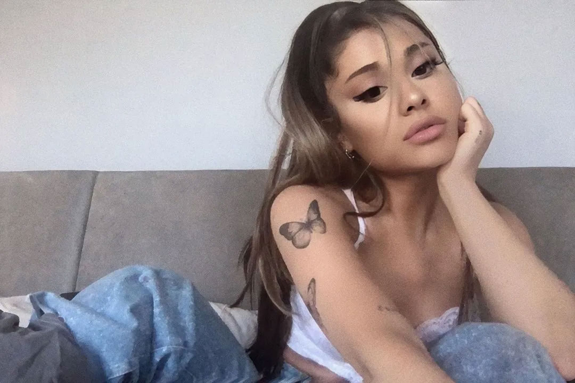 Ariana Grande wearing a white Cosabella bralette
