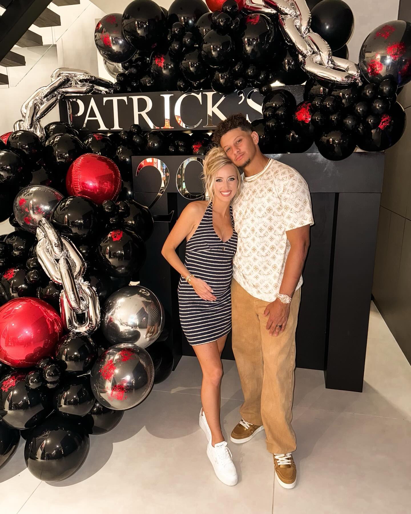 Patrick and Brittany Mahomes posing together 