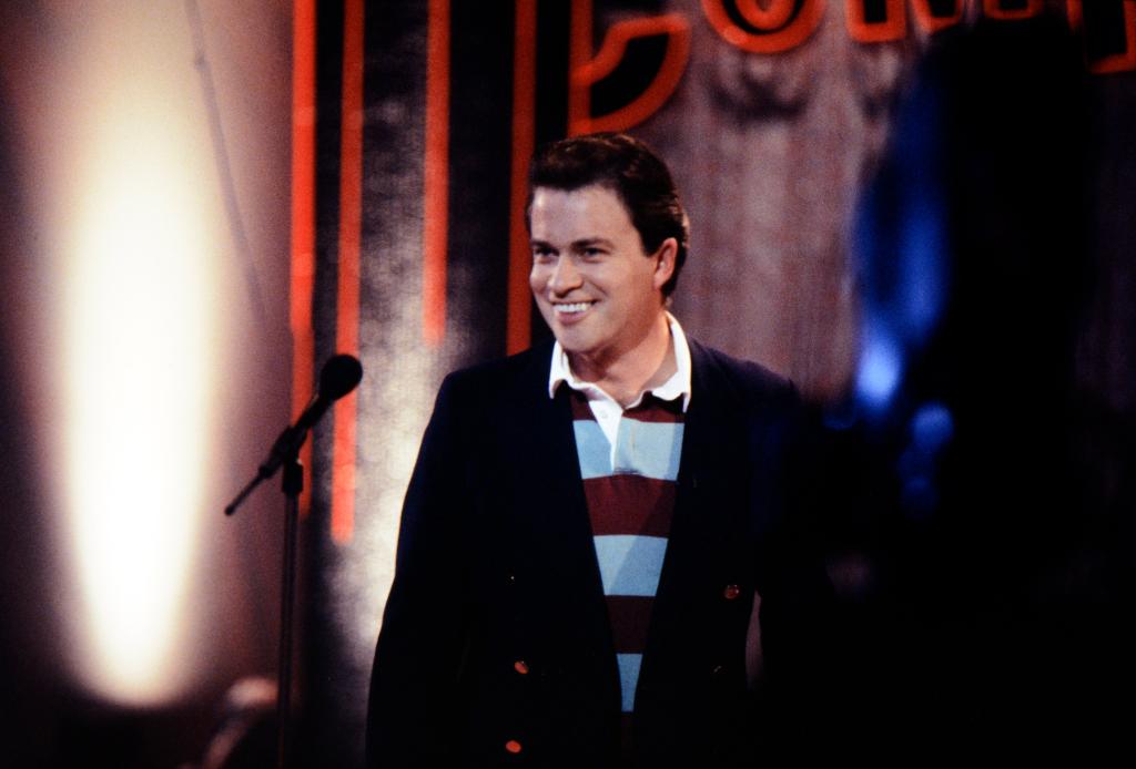  Harry Enfield performing as "Tim Nice But Dim" in 1995. 