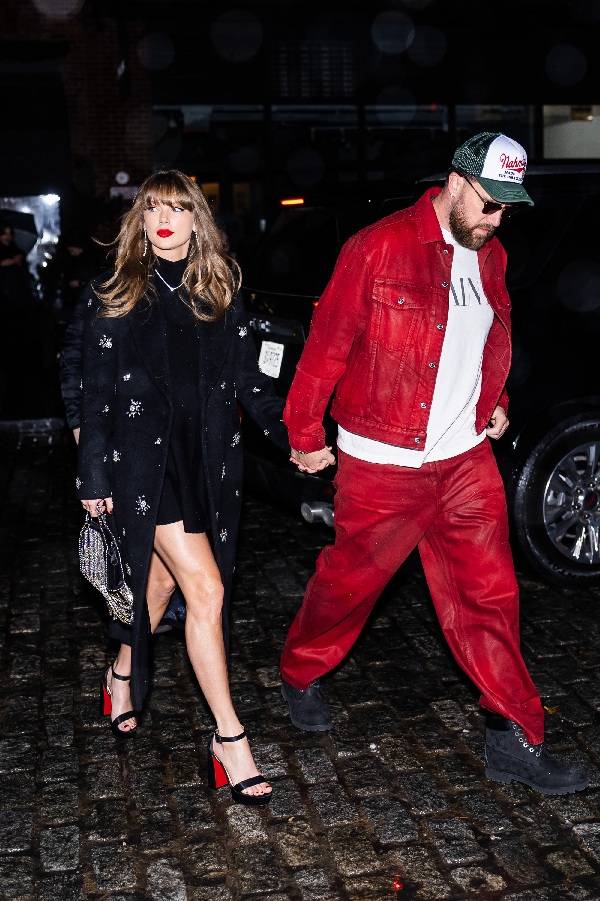 Taylor Swift (L) and Travis Kelce are seen in the Meatpacking District on December 28, 2024 in New York City.